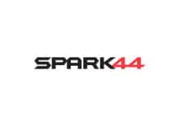 the spark logo is shown in red and black